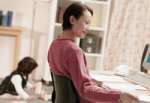 woman sitting at a desk